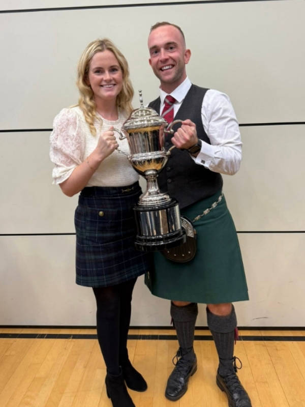 James Stone being presented with Alec Brown Memorial trophy,by his daughter Teresa.....for winning the Senior Piping